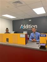 Two student tellers in our bank branch Two student tellers in our bank branch